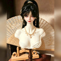 1/3 scale BJD bust stand displaying a doll head with black wig and pearl jewelry