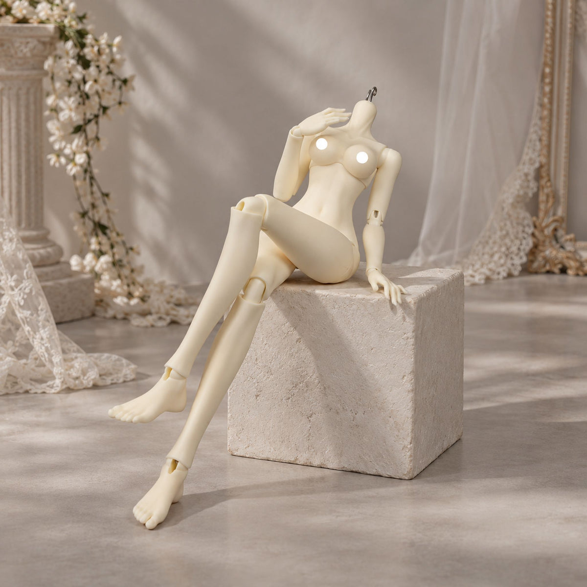 Female BJD body seated pose showing long legs, body curves and articulation