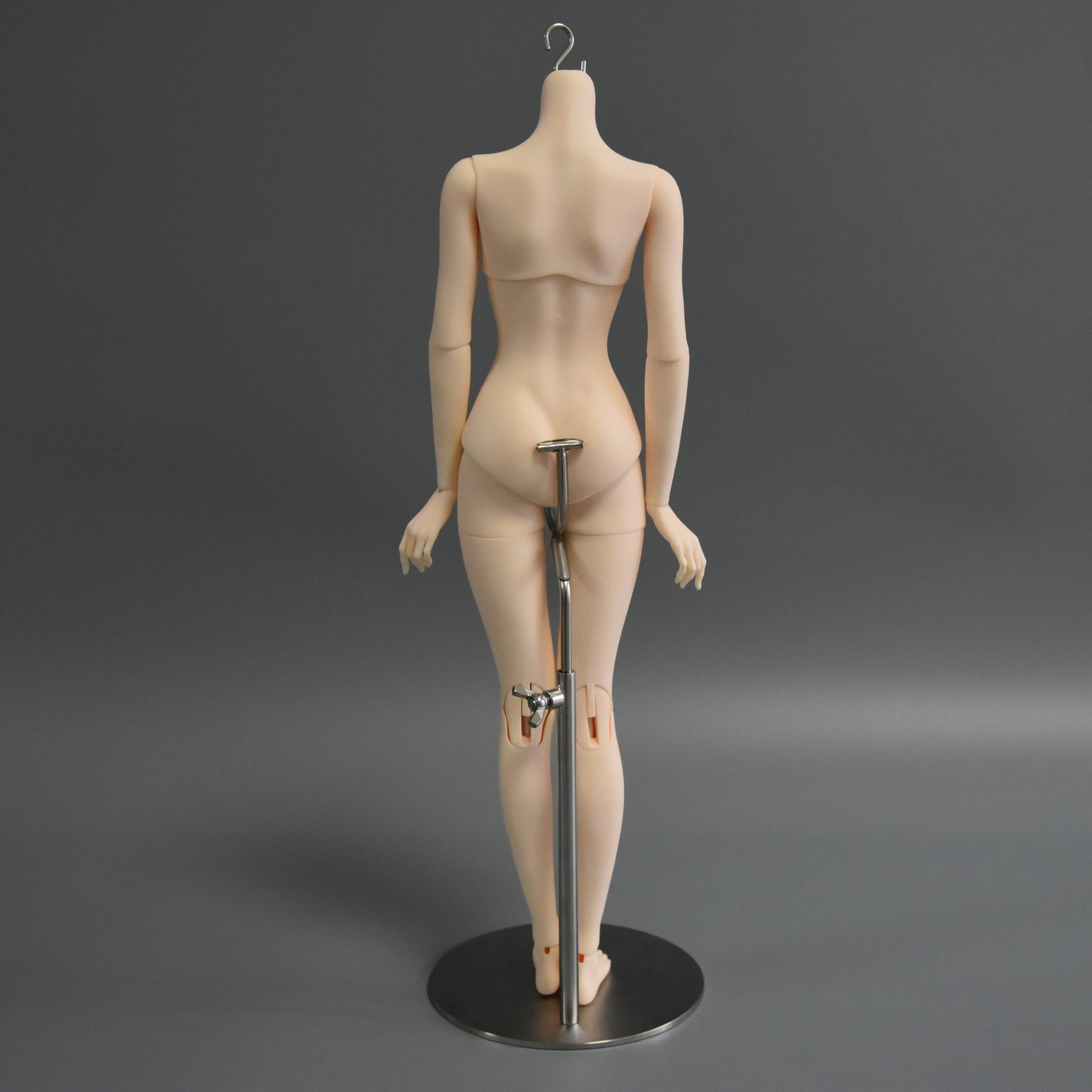 1/4 scale female resin BJD body with articulated joints, side profile view