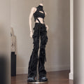 Styled 1/4 scale male BJD body wearing black harness top and cargo pants