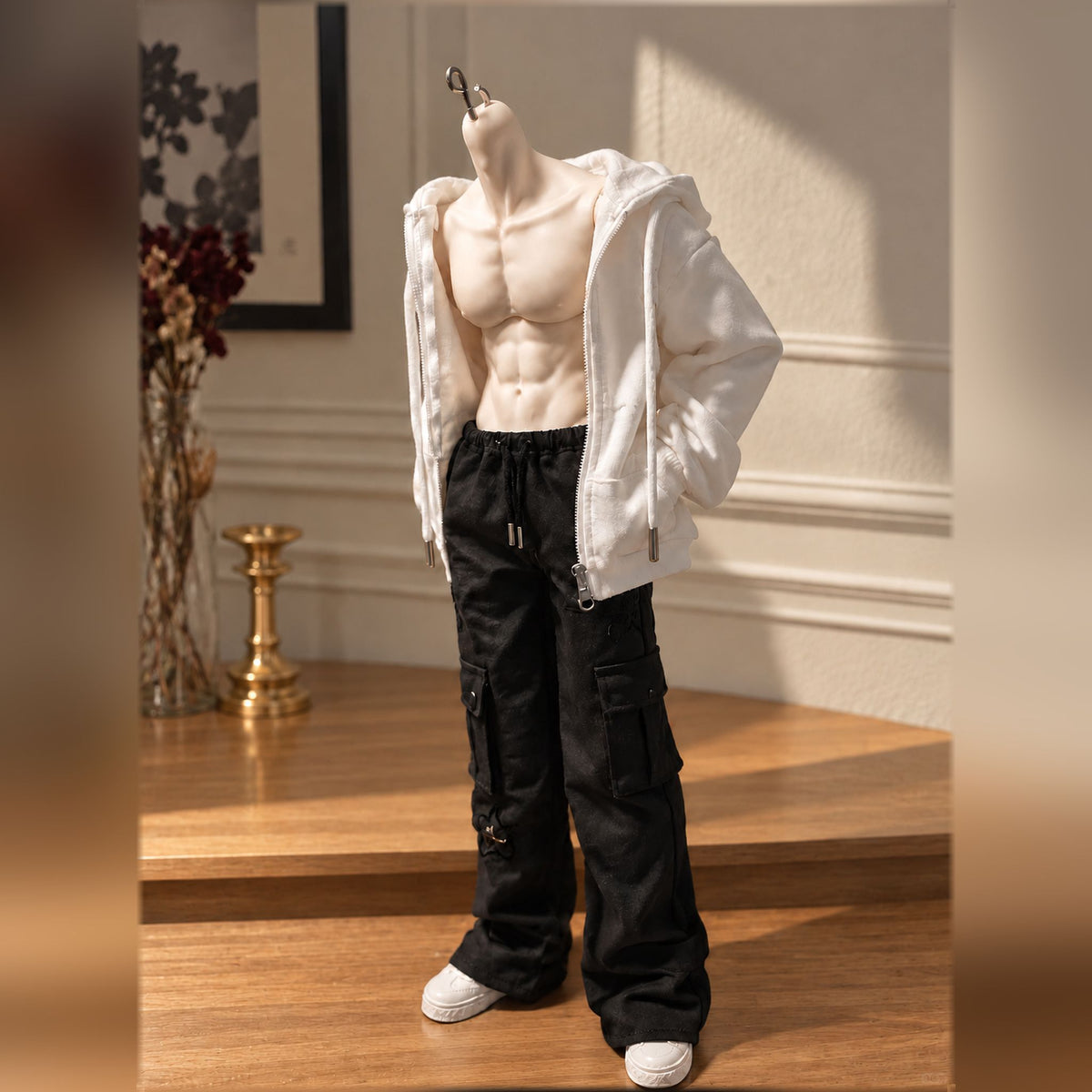 Styled 1/4 scale male BJD body wearing a white hoodie and black cargo pants