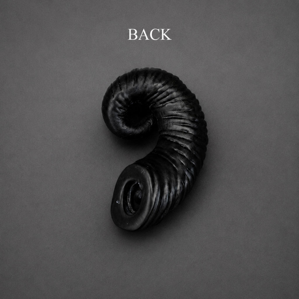 BJD doll ram horns accessory side view, black curved horns with sculpted ribbed texture