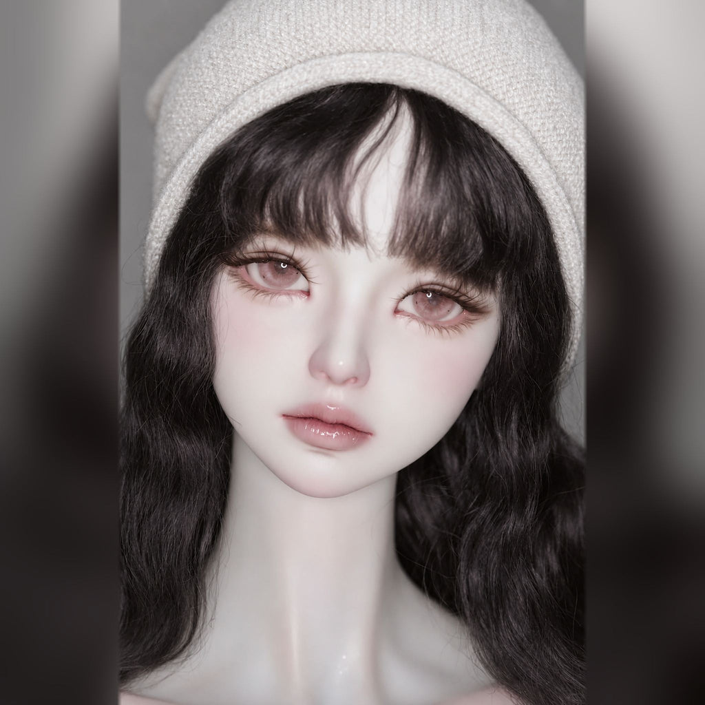Styled female BJD head with long wavy black hair, cream knit beanie, soft pink eyes and glossy lips