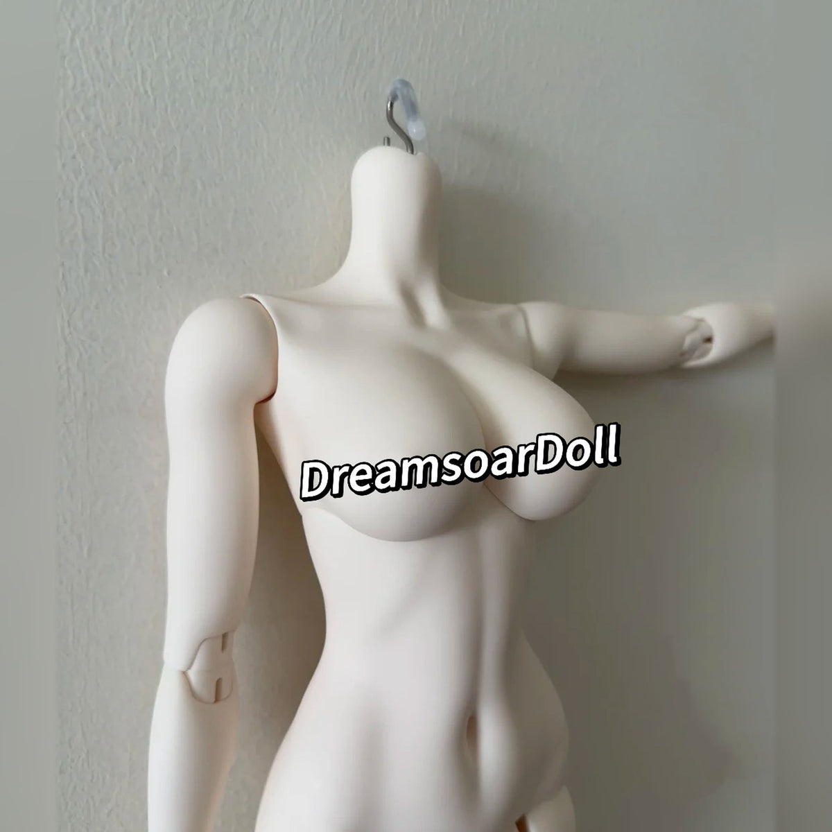 Close-up of female BJD upper body with poseable shoulder and elbow joints