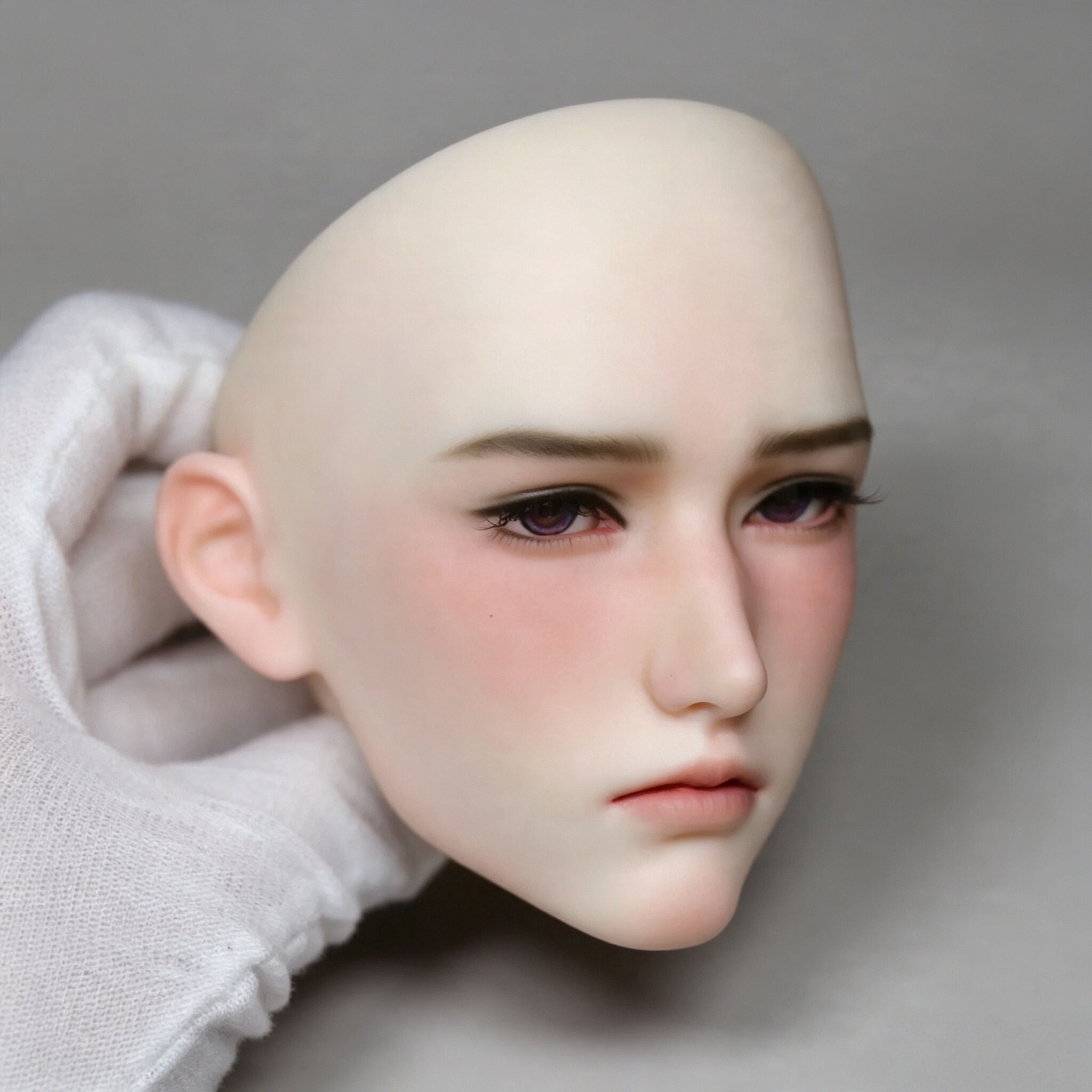 1/3 Scale male BJD head side profile with custom face-up and detailed facial sculpt
