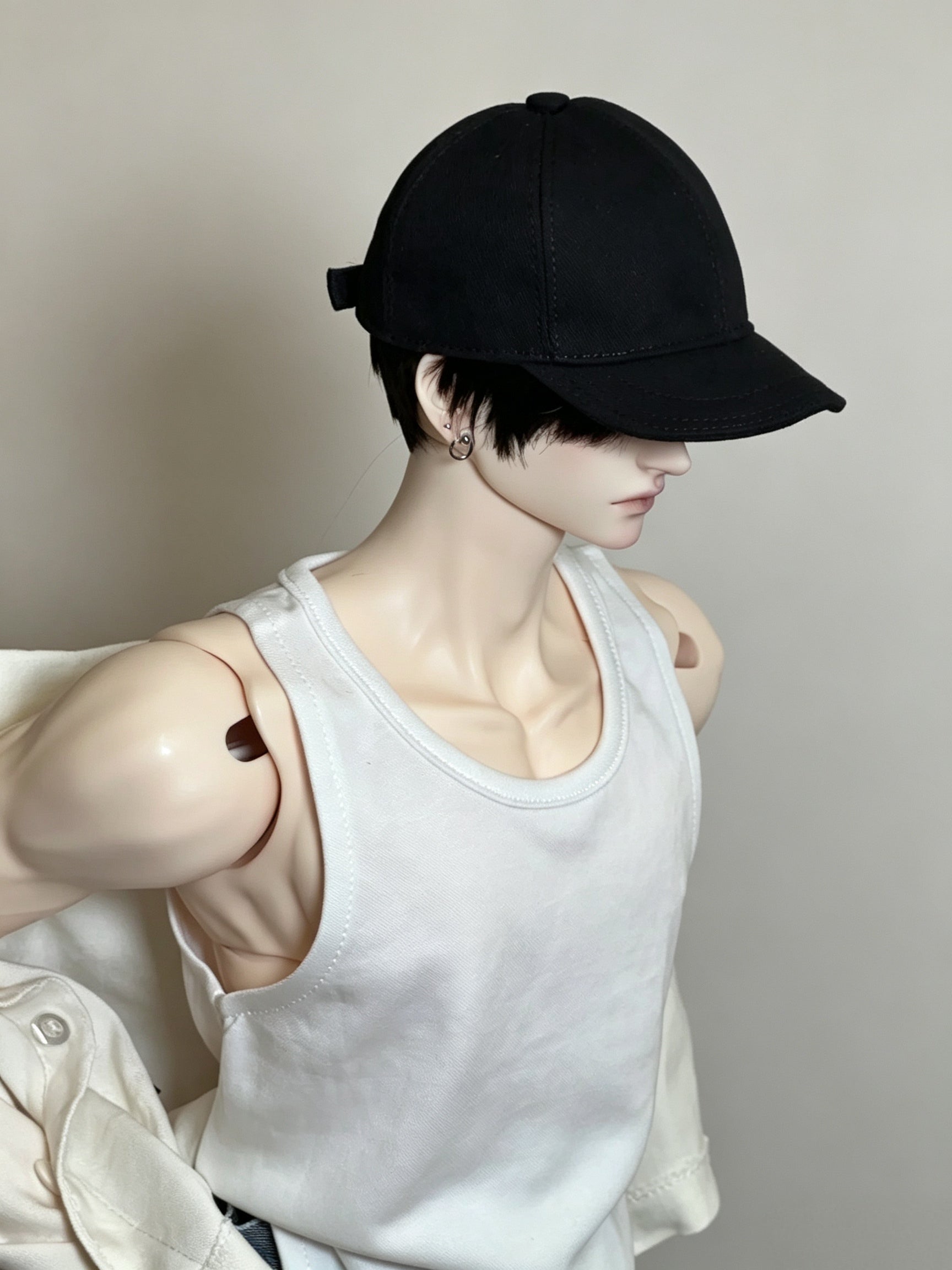 Side profile of 75cm male BJD body showing shoulder width and masculine silhouette