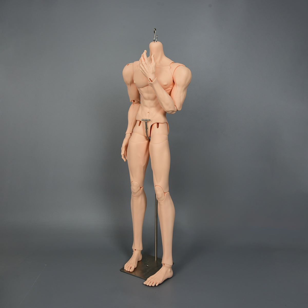 Side view of 75cm male BJD doll body showing realistic anatomy and handcrafted resin details
