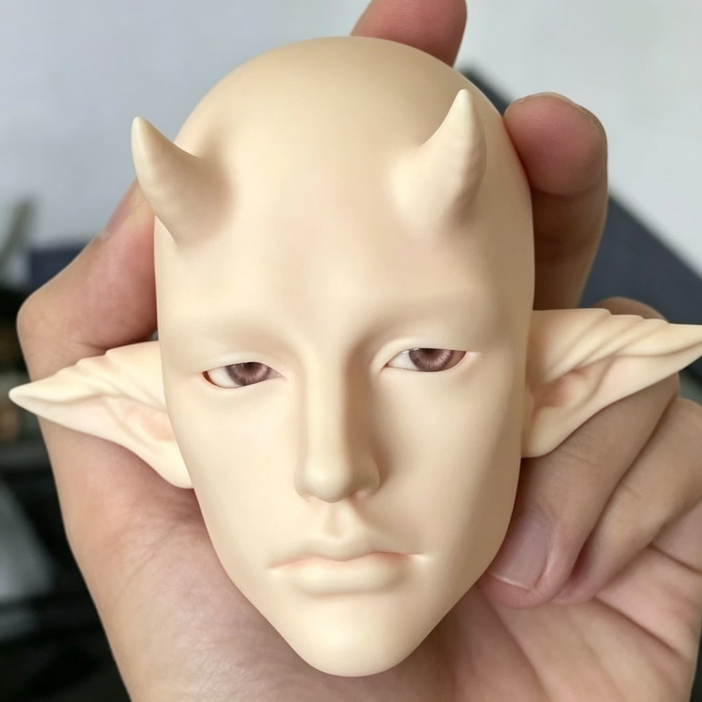 Fantasy male BJD doll head with custom sculpt details and unique character design