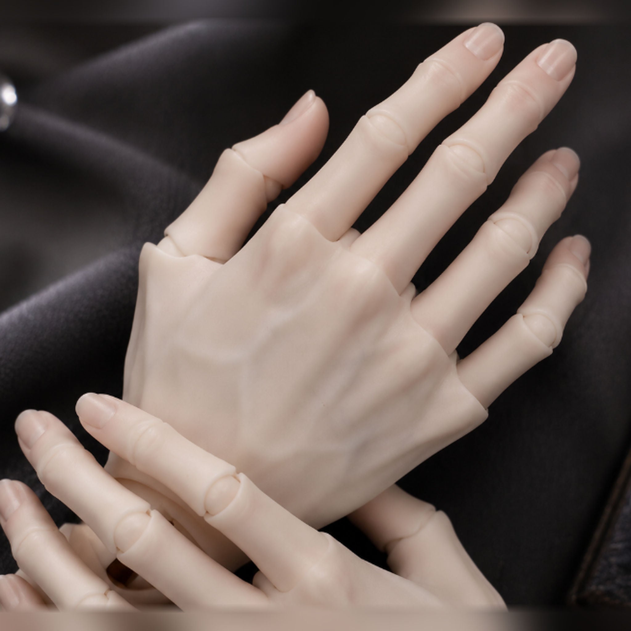 BJD jointed hands installed on a doll showing realistic articulated fingers and natural hand proportions
