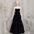 Female BJD doll displayed with styled outfit to demonstrate body proportions and clothing compatibility