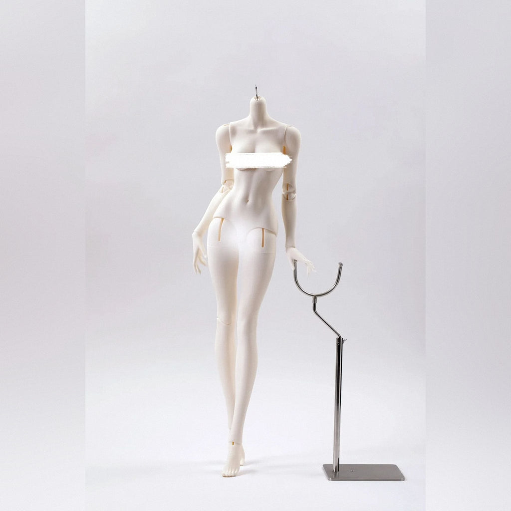 Female resin BJD doll body standing beside a display stand showing elegant proportions and balance