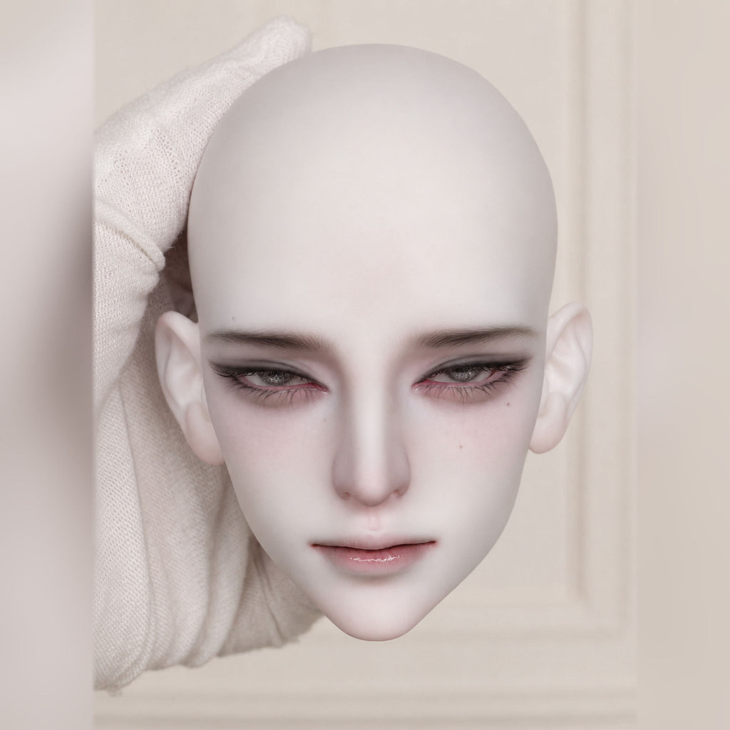 large male BJD head sculpt with custom face-up, white wig styling and delicate fantasy makeup details
