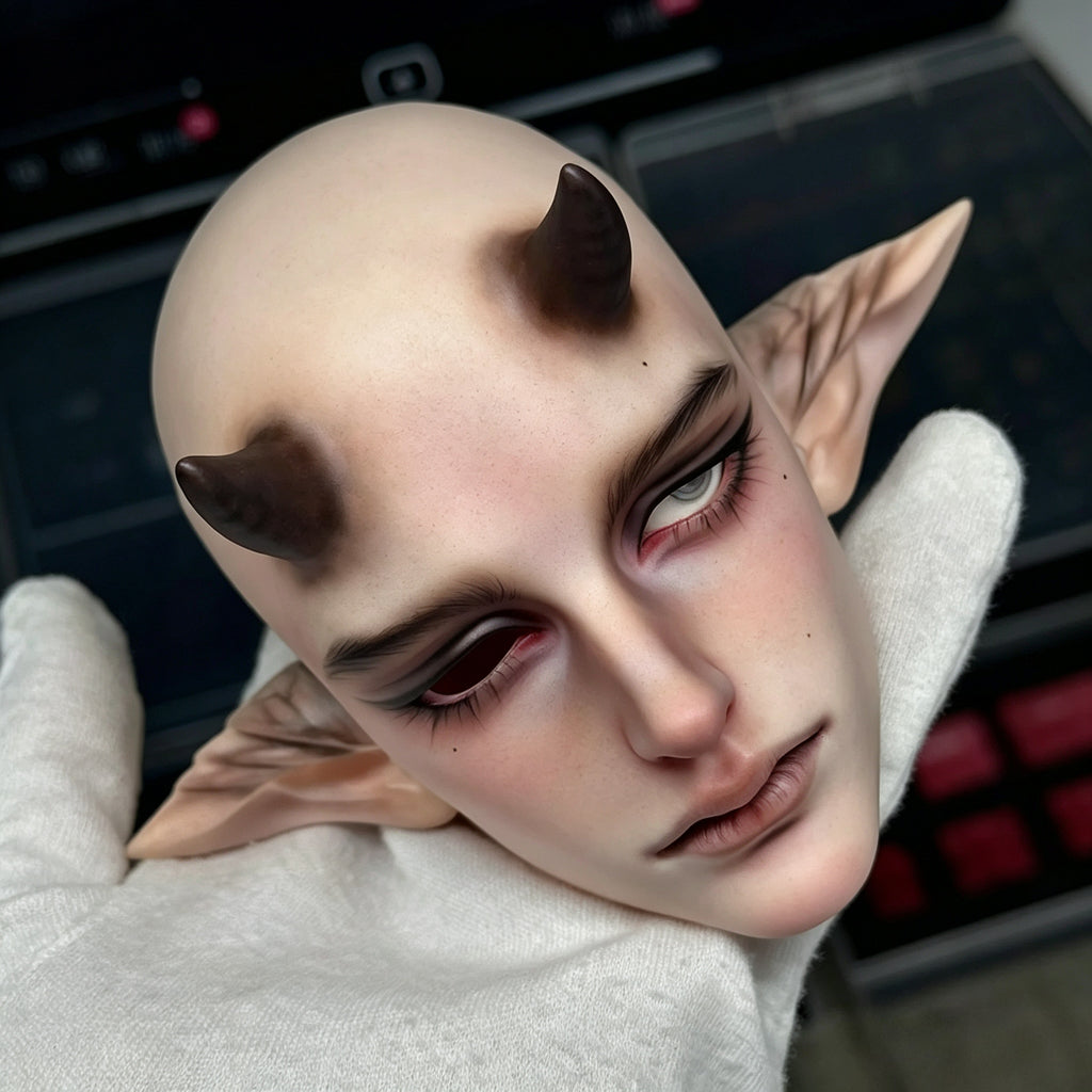 Male BJD doll head side profile showing detailed sculpting and custom face-up artwork