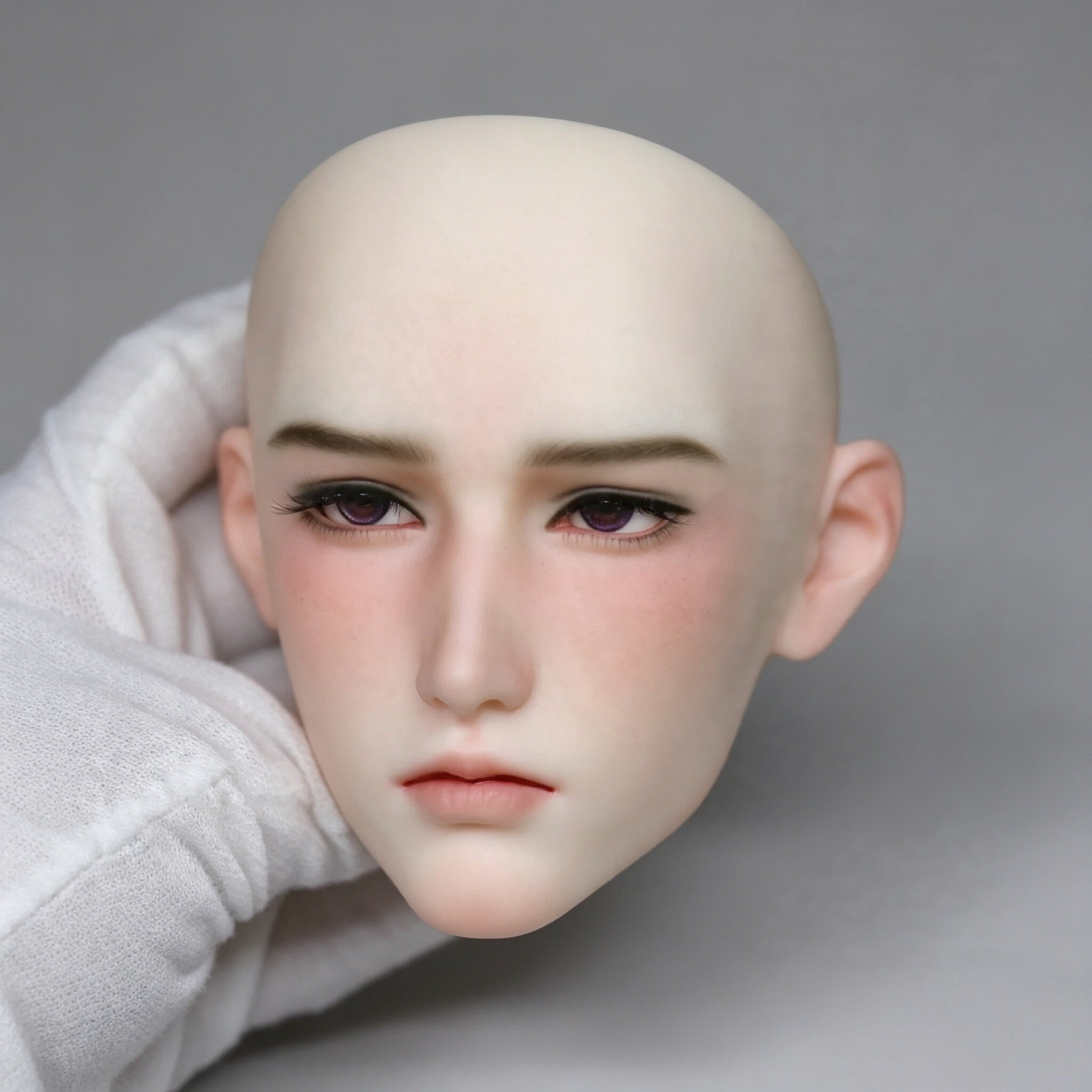 Male BJD head sculpt with custom makeup example, soft youthful doll face design